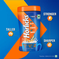 Horlicks Classic Malt jar with serving cup beside it for quick portions.