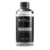 Hotel Collection Bonbori diffuser oil bottle close-up showing bergamot jasmine and rose scent for living room ambiance