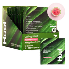 Huel Daily Greens Watermelon powder with scoop for convenient daily nutrition.