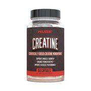 Huge Supplements Creatine Monohydrate capsules bottle with label showing purity and 5g serving