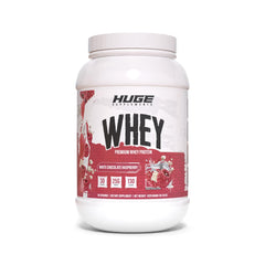 Huge Whey Protein tub front in White Chocolate Raspberry supports muscle fueling.