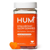 HUM Hyaluronic Glow bottle closeup for skin hydration.