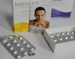 Imedeen Time Perfection Tabs tablets on hand suggest easy daily routine.