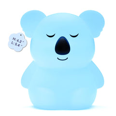 InnoCity Breathing Pal Plus Kyle on bedside table, soothing breathing with soft light cues.