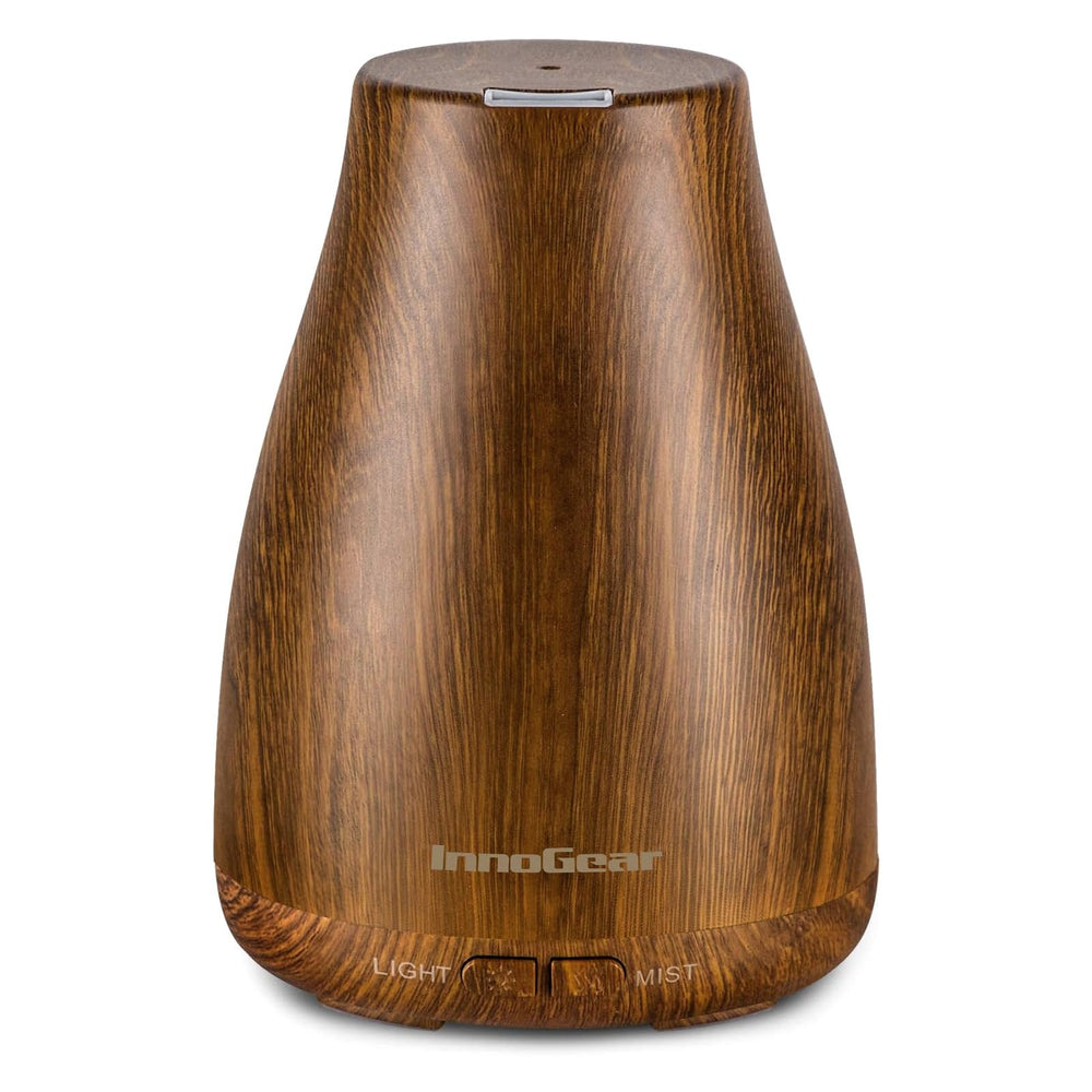 InnoGear essential oil diffuser with bronze finish for a stylish, relaxing bedroom ambiance.
