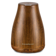 InnoGear essential oil diffuser with bronze finish for a stylish, relaxing bedroom ambiance.