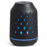 InnoGear stone diffuser with ceramic star cover, warm ambient glow