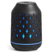 InnoGear stone diffuser with ceramic star cover, warm ambient glow