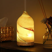 Inrorans hand-blown glass diffuser adds artistic flair for home aromatherapy.