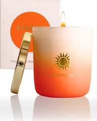 Inspired Picks Orange Candle bergamot-rosewood scent creates warm ambiance.