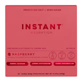Instant Hydration raspberry electrolyte drink packets close-up for on-the-go hydration