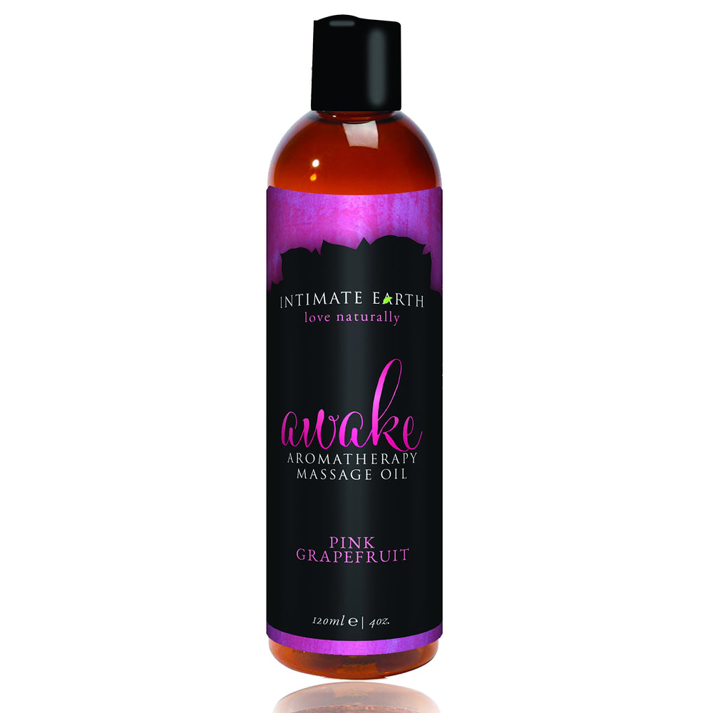 Intimate Earth Awake massage oil with pink grapefruit for soothing muscles and relaxing aromatherapy.