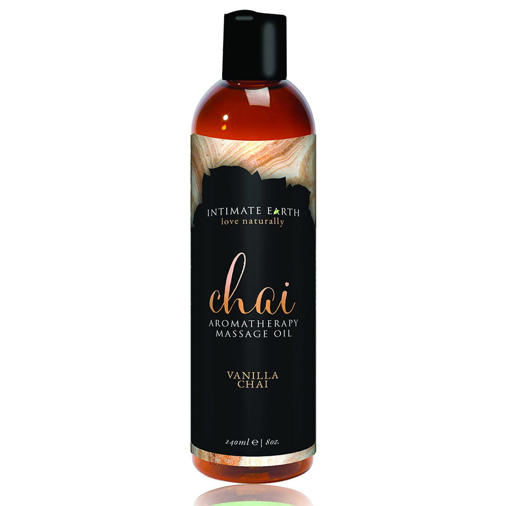 Intimate Earth Chai Vanilla massage oil bottle pour promotes sensual relaxation