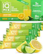 IQMIX Lemon Lime packet beside a glass for on-the-go hydration