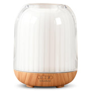 Iribonheur essential oil diffuser with wood-grain base, delivering a calming aroma for any room.