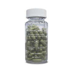 Isagenix PuraPlant21 bottle on a kitchen counter for daily plant-based nutrition.