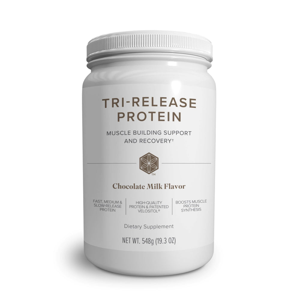 Isagenix Tri-Release Protein canister in chocolate milk flavor, non-GMO and gluten-free.