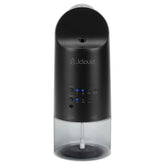 JCLOUD Plug-in Diffuser mounted in a wall outlet with a rotatable plug for flexible placement