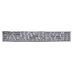 Jennies Goji Moji Coconut Bar sliced and ready to eat, rich coconut with dark chocolate and goji