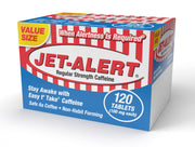 Jet-Alert 100 mg caffeine tab bottle on a desk for quick daytime alertness.