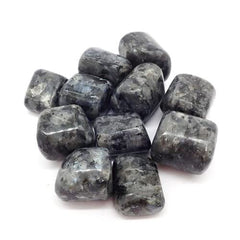 Jet International Energized Larvikite tumbled stone closeup showing natural texture and smooth finish