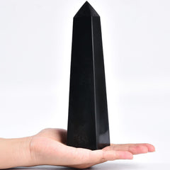 JIC Gem obsidian crystal tower close-up highlighting natural facets