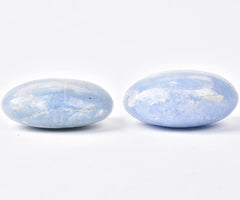 JIC Gem blue celestite palm stone close-up showing natural texture and color.