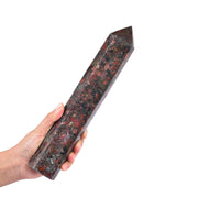 JIC Gem Brazilian Red Agate Tower front view highlighting hexagonal facets for meditation focus.