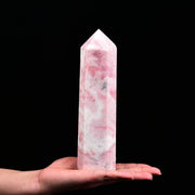 JIC Gem extra large pink powder opal quartz crystal point shown as a bold desktop decor centerpiece