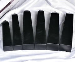 JIC Gem grounding obelisk supports focus and balance during quiet practice.