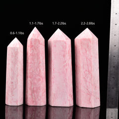 JIC Gem pink opal obelisk resting on a shelf as elegant home decor