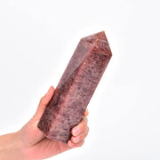 JIC Gem red crystal tower front view with warm strawberry quartz glow for desk decor