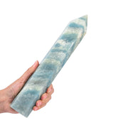 JIC Gem trolleite obelisk wand with blue glow for meditation and calm focus.