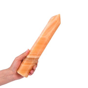 JIC Gem yellow calcite tower shines in natural light for meditation.