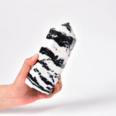 JIC Gem Zebra Jasper crystal obelisk highlighting focus during practice.