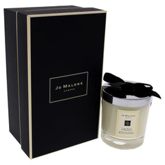 Jo Malone Lime Basil & Mandarin candle base notes amberwood and woods warmth