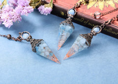 Close view of Jovivi pendulum chain detail and craftsmanship.