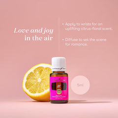 Joy essential oil topical application with carrier oil for safe aromatherapy.