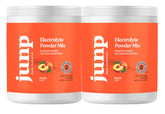 JUNP Orchard Fresh Peach electrolyte powder dissolving in water for hydration