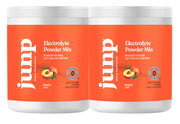 JUNP Orchard Fresh Peach electrolyte powder dissolving in water for hydration