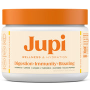 Jupi Hydration & Wellness shot in glass shows turmeric-ginger blend for immune-support