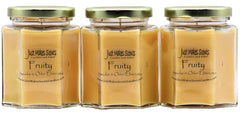 Just Makes Scents 3-pack fruit scented odor eliminator candle for odor elimination at home.