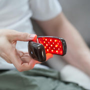 KAISAR portable wireless therapy device for convenient on-the-go relief.