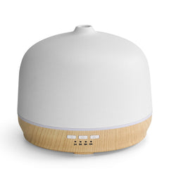 Kakoda ceramic diffuser with wood cover for elegant decor and durable finish.