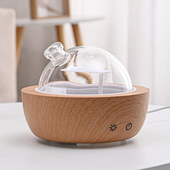 Kakoda diffuser with woodgrain base suits modern interiors