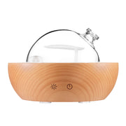 Kakoda glass diffuser top view shows elegant glass with wood base for calm aromatherapy.
