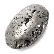 KALIFANO pyrite palm stone close-up showing brilliant luster and energy vibes.