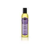 KAMA SUTRA Harmony Blend bottle pouring for a soothing full-body massage.