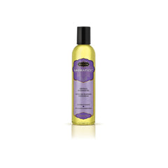 KAMA SUTRA Harmony Blend bottle pouring for a soothing full-body massage.