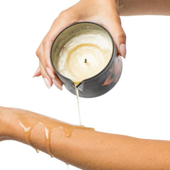 Kama Sutra Candle aroma with essential oils for calming ambiance.